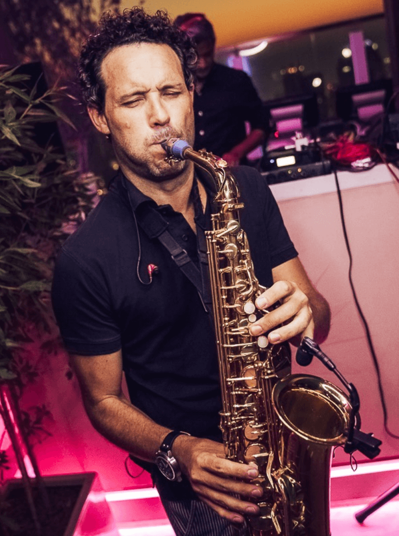 Adam Long playing the saxaphone in Dubai