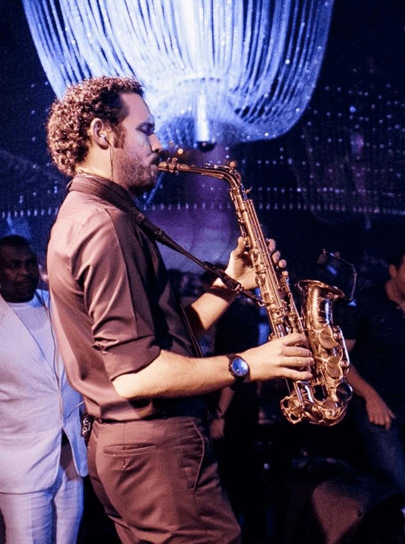 Adam Long performing on the saxophone